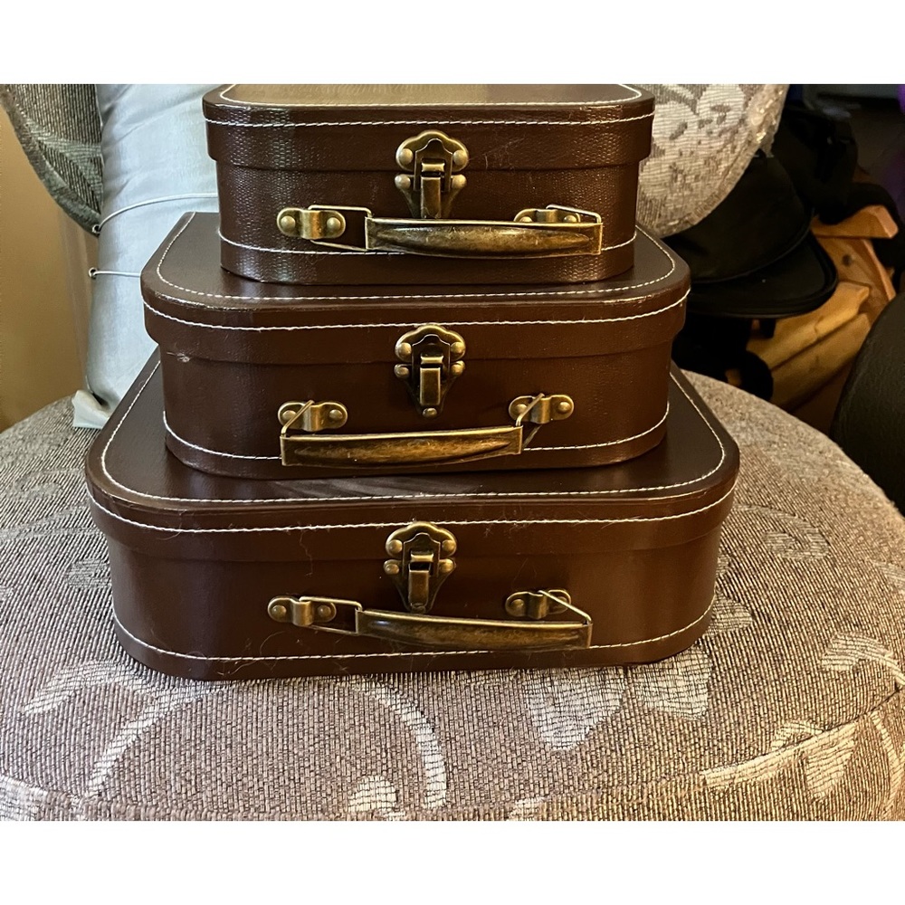 Vintage style stackable suitcase accent pieces that double as attractive storage